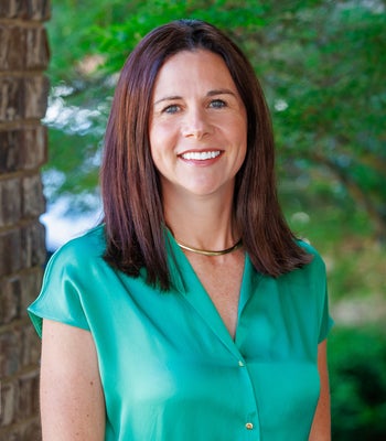 Portrait of Kelley Caine, REALTOR.